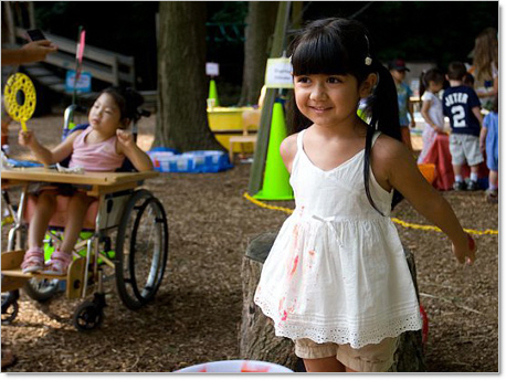 kindergarten girl playing during summer camp